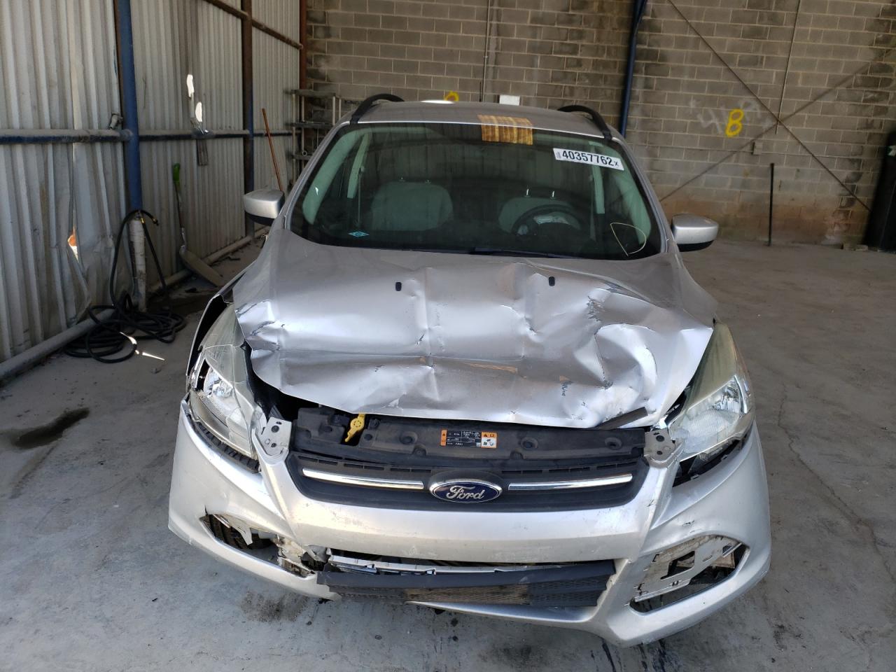 Photo 9 from auction – 2016 FORD ESCAPE SE with VIN 1FMCU0GX0GUC34089