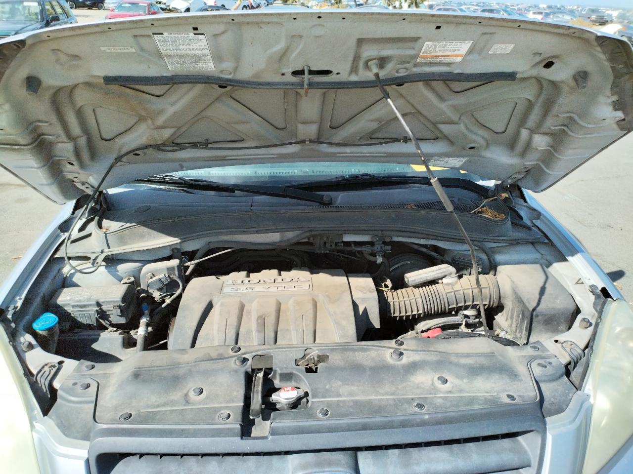 Photo 7 from auction – 2005 HONDA PILOT EXL with VIN 5FNYF18555B034743