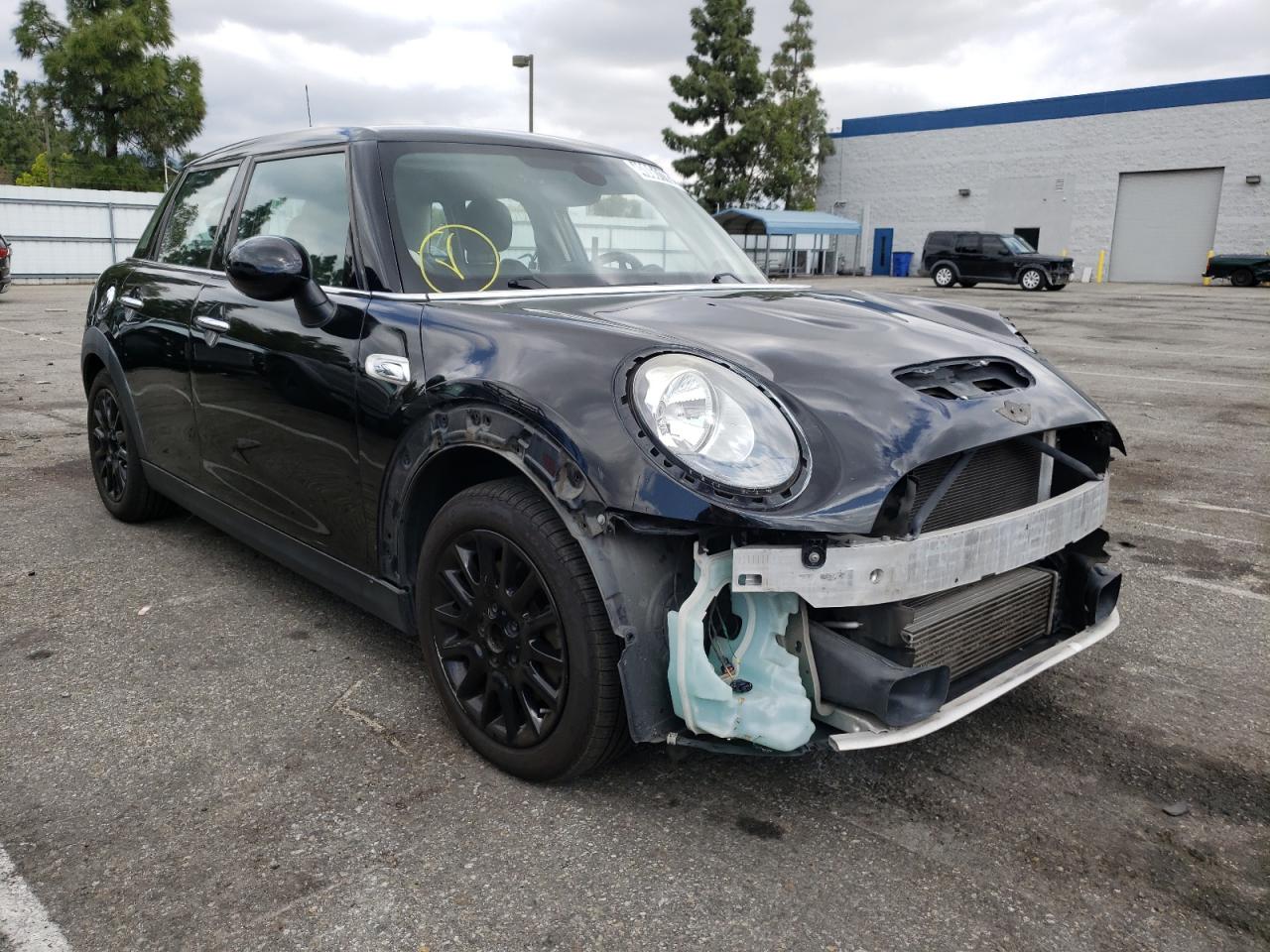 MINI COOPER S 2015 with VIN WMWXU3C59F2B57826 - Photo from auction