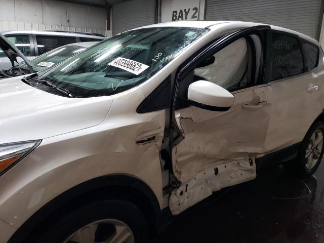 Photo 9 from auction – 2014 FORD ESCAPE SE with VIN 1FMCU9GXXEUA64003
