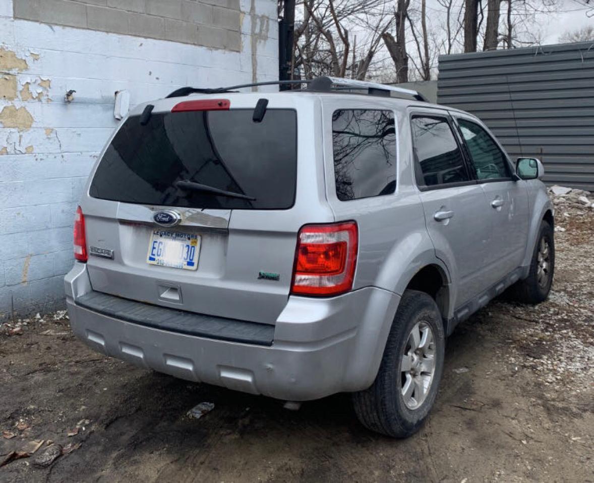 Photo 4 from auction – 2010 FORD ESCAPE LIM with VIN 1FMCU9EG8AKA68611