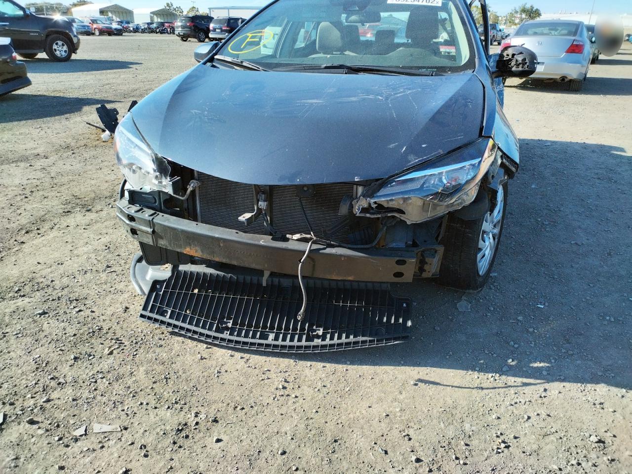 Photo 9 from auction – 2017 TOYOTA COROLLA L with VIN 5YFBURHE0HP694563