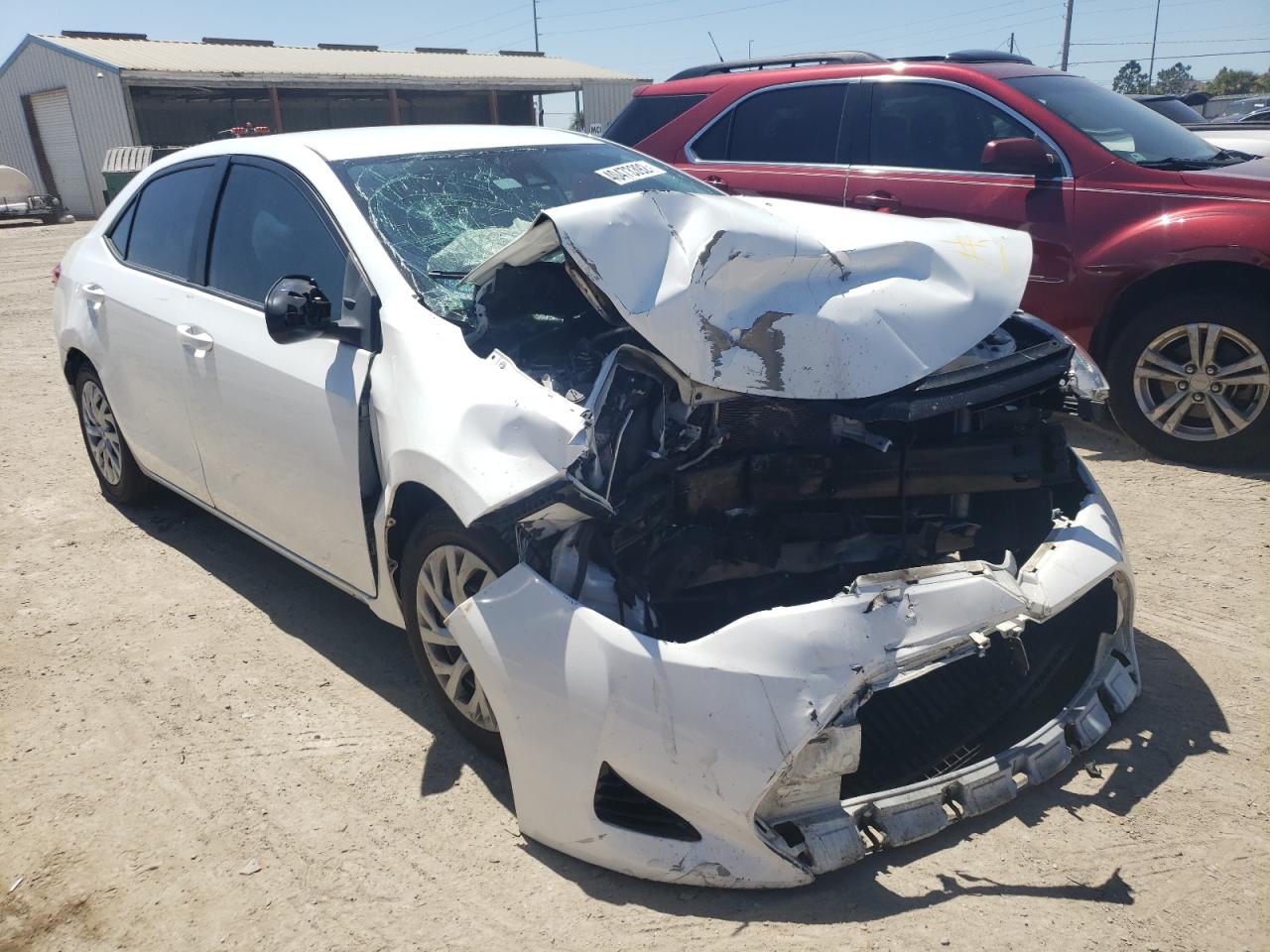 TOYOTA COROLLA L 2018 with VIN 5YFBURHE5JP778741 - Photo from auction
