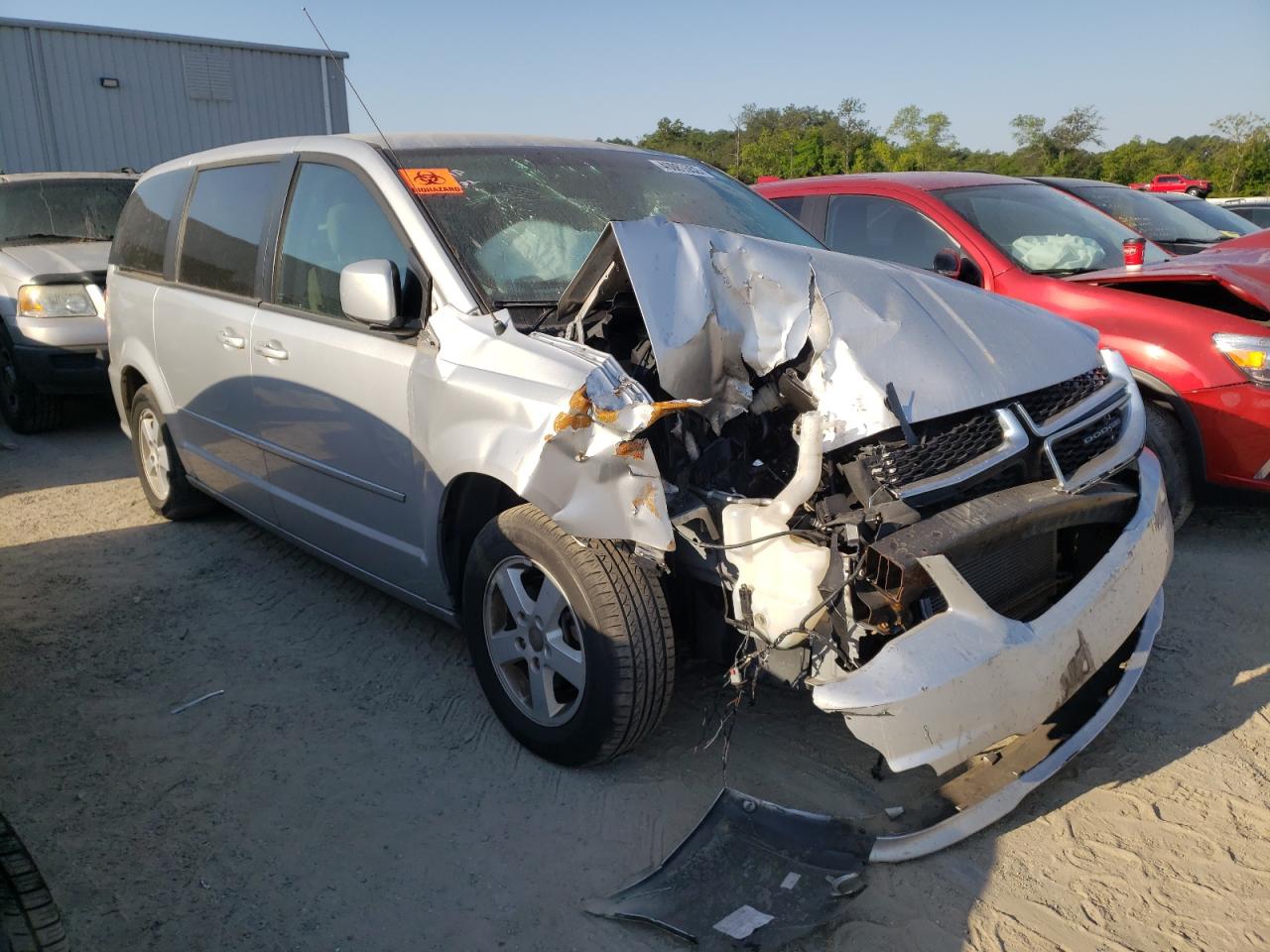 DODGE GRAND CARA 2011 with VIN 2D4RN3DG3BR786373 - Photo from auction