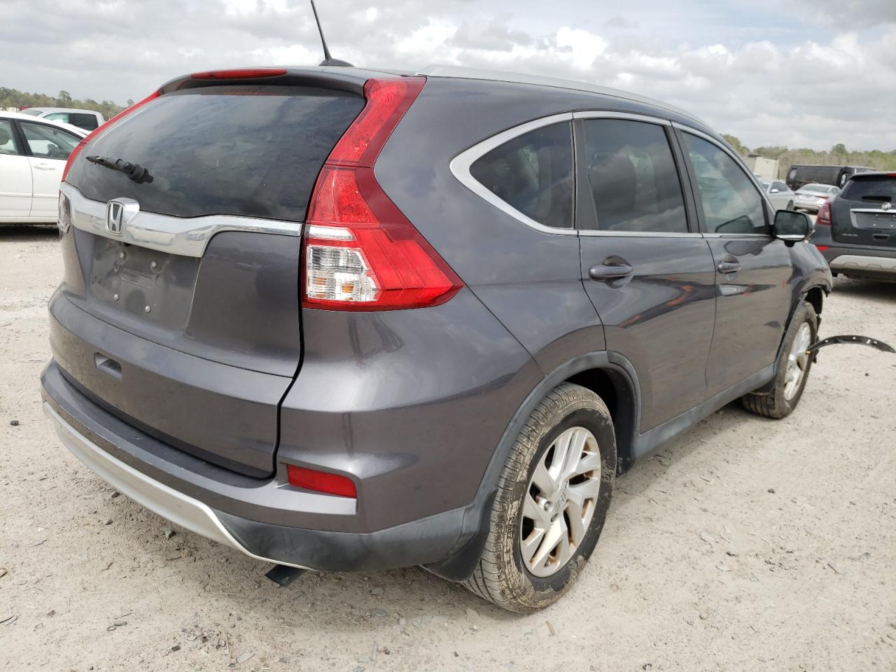 Photo 4 from auction – 2016 HONDA CR-V EXL with VIN 2HKRM3H73GH505803