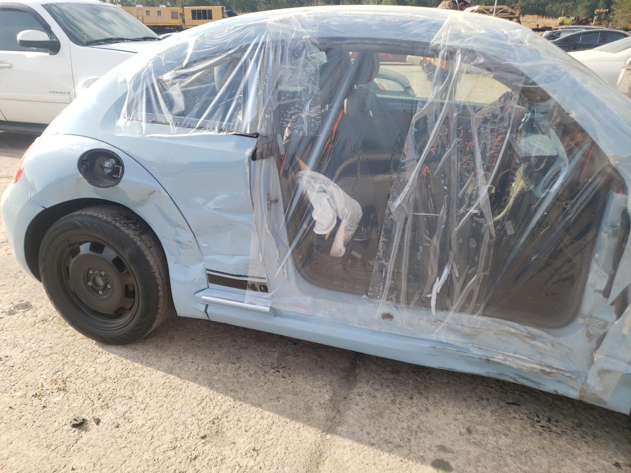 Photo 9 from auction – 2014 VOLKSWAGEN BEETLE with VIN 3VWJP7AT0EM609270