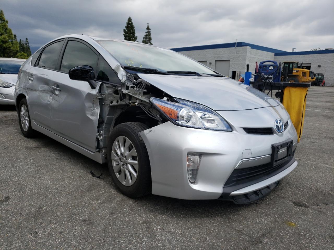 TOYOTA PRIUS PLUG 2014 with VIN JTDKN3DP0E3057128 - Photo from auction