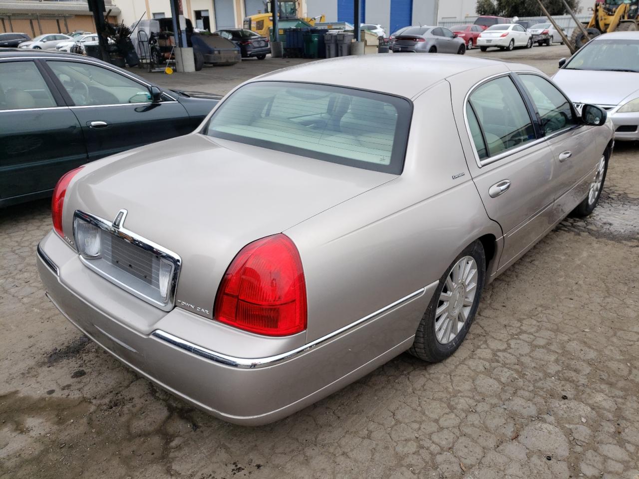 Photo 4 from auction – 2003 LINCOLN TOWN CAR E with VIN 1LNHM81W23Y674175