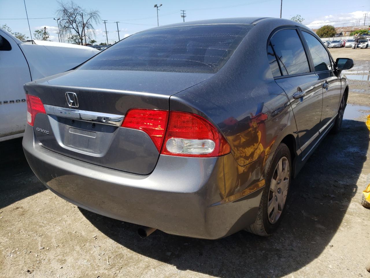 Photo 4 from auction – 2010 HONDA CIVIC LX with VIN 19XFA1F5XAE038490