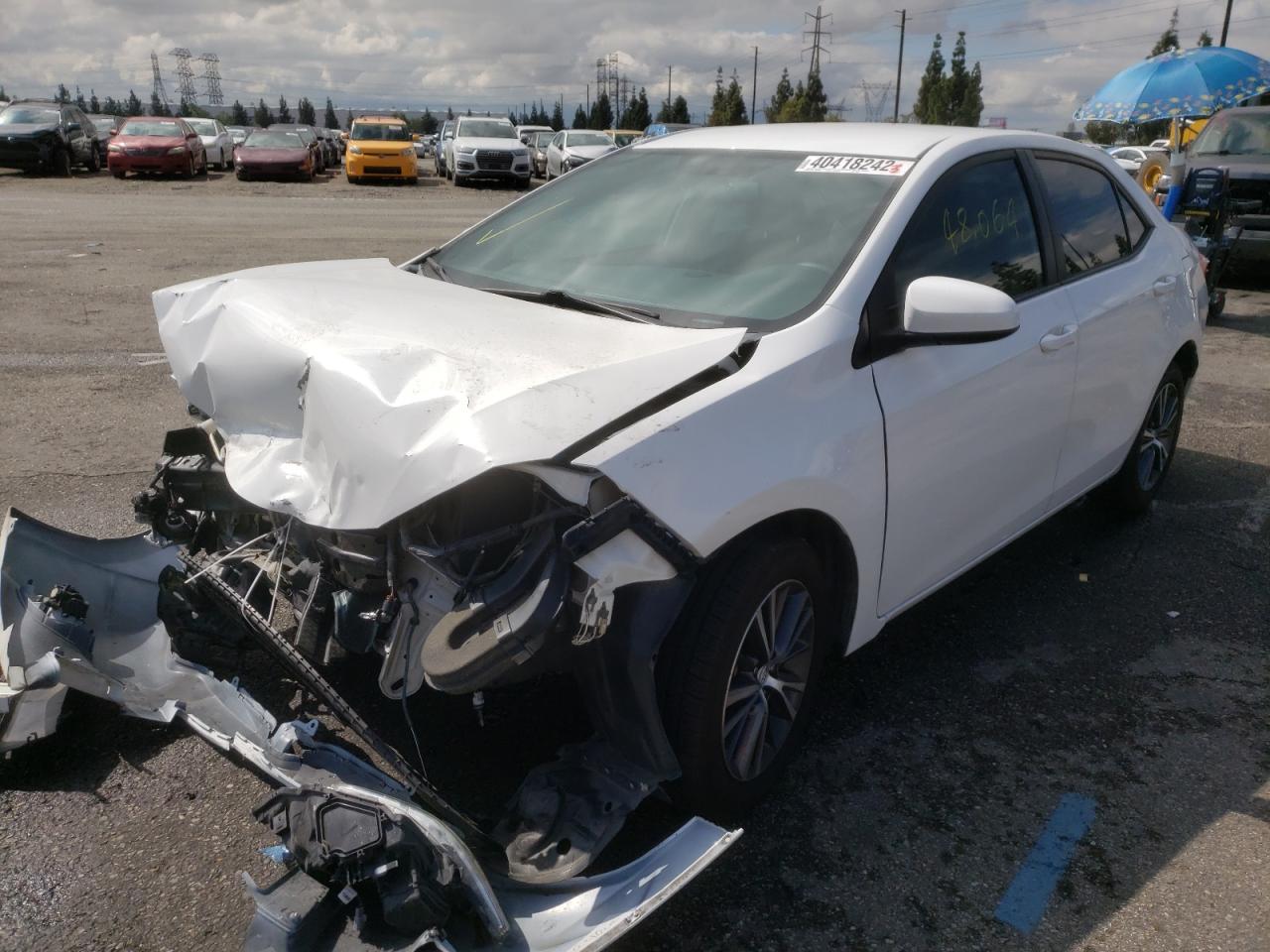 Photo 2 from auction – 2016 TOYOTA COROLLA L with VIN 5YFBURHE0GP486813