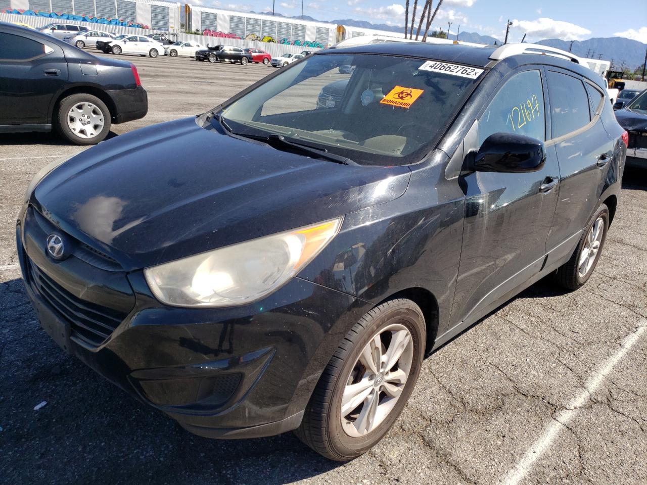 Photo 2 from auction – 2011 HYUNDAI TUCSON GLS with VIN KM8JU3AC2BU229936