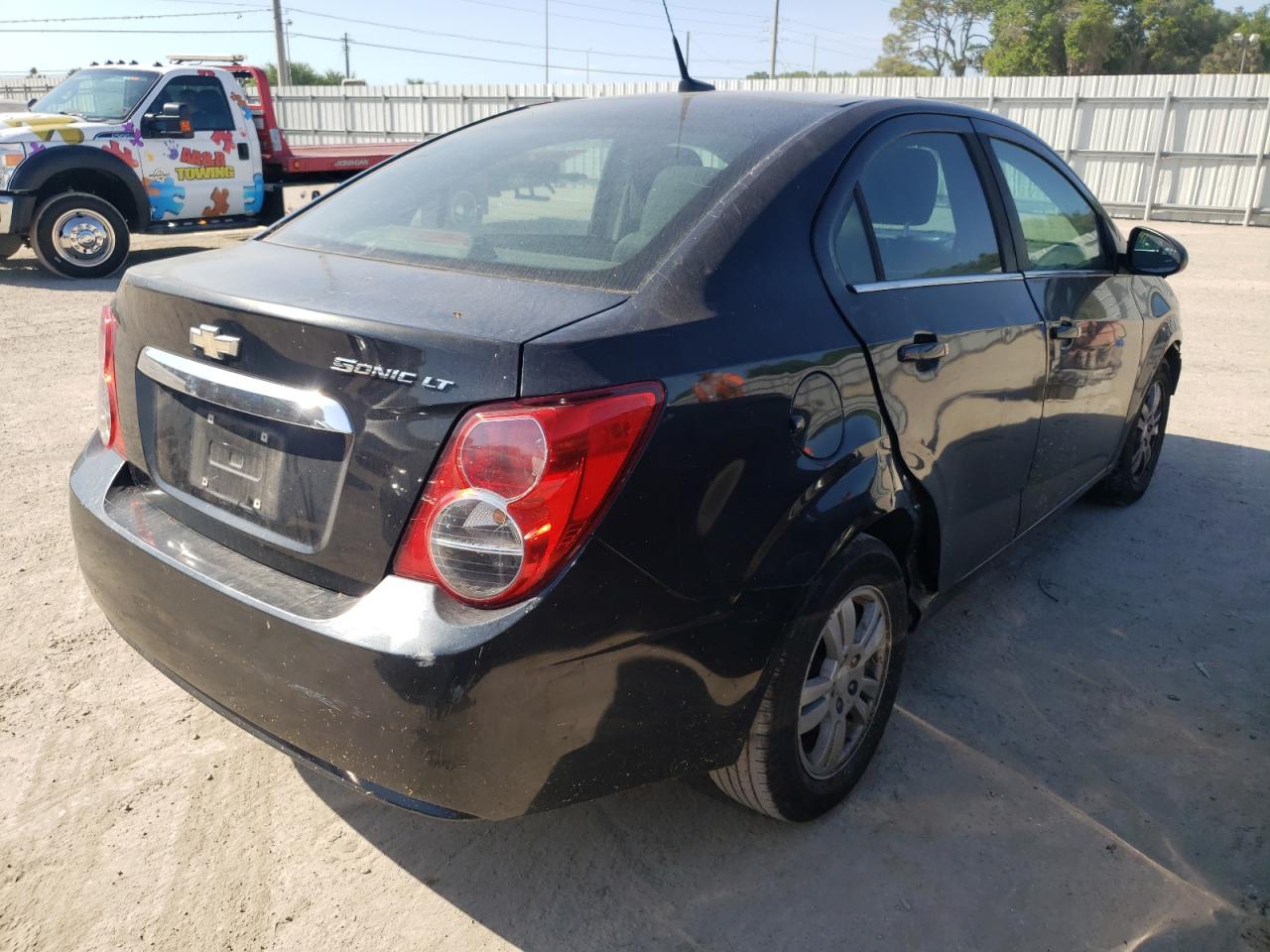 Photo 4 from auction – 2014 CHEVROLET SONIC LT with VIN 1G1JC5SH2E4166931