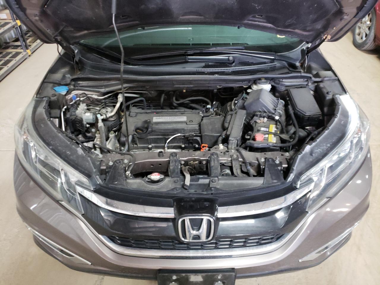 Photo 7 from auction – 2015 HONDA CR-V EXL with VIN 5J6RM4H77FL051971