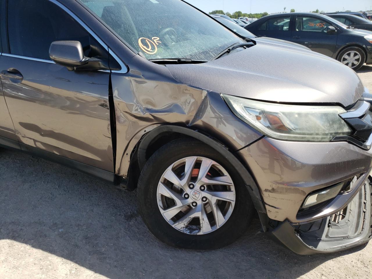 Photo 9 from auction – 2015 HONDA CR-V EX with VIN 3CZRM3H53FG709579