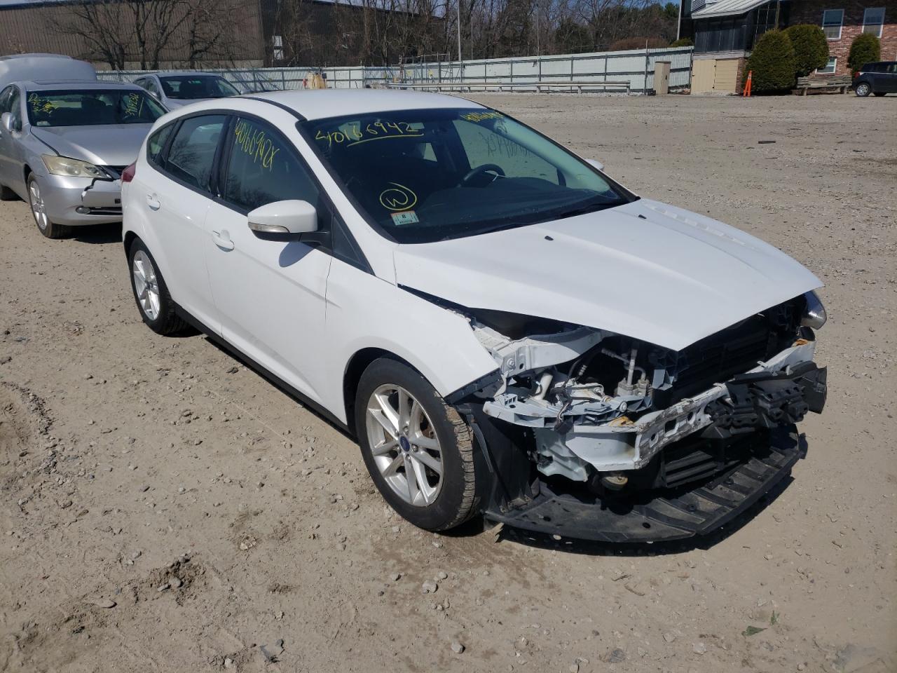 FORD FOCUS SE 2016 with VIN 1FADP3K22GL230859 - Photo from auction