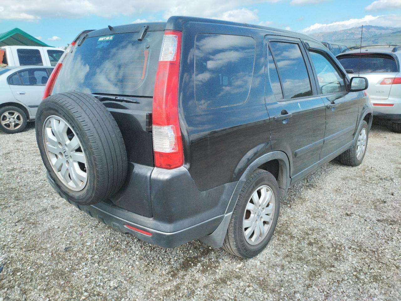 Photo 4 from auction – 2005 HONDA CR-V LX with VIN JHLRD68585C018799