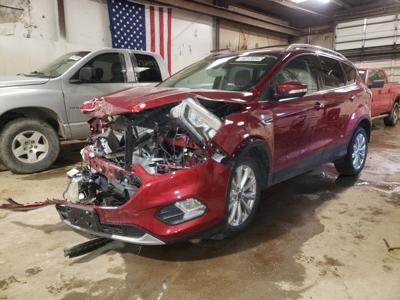 Photo 2 from auction – 2017 FORD ESCAPE TIT with VIN 1FMCU9J91HUE95702