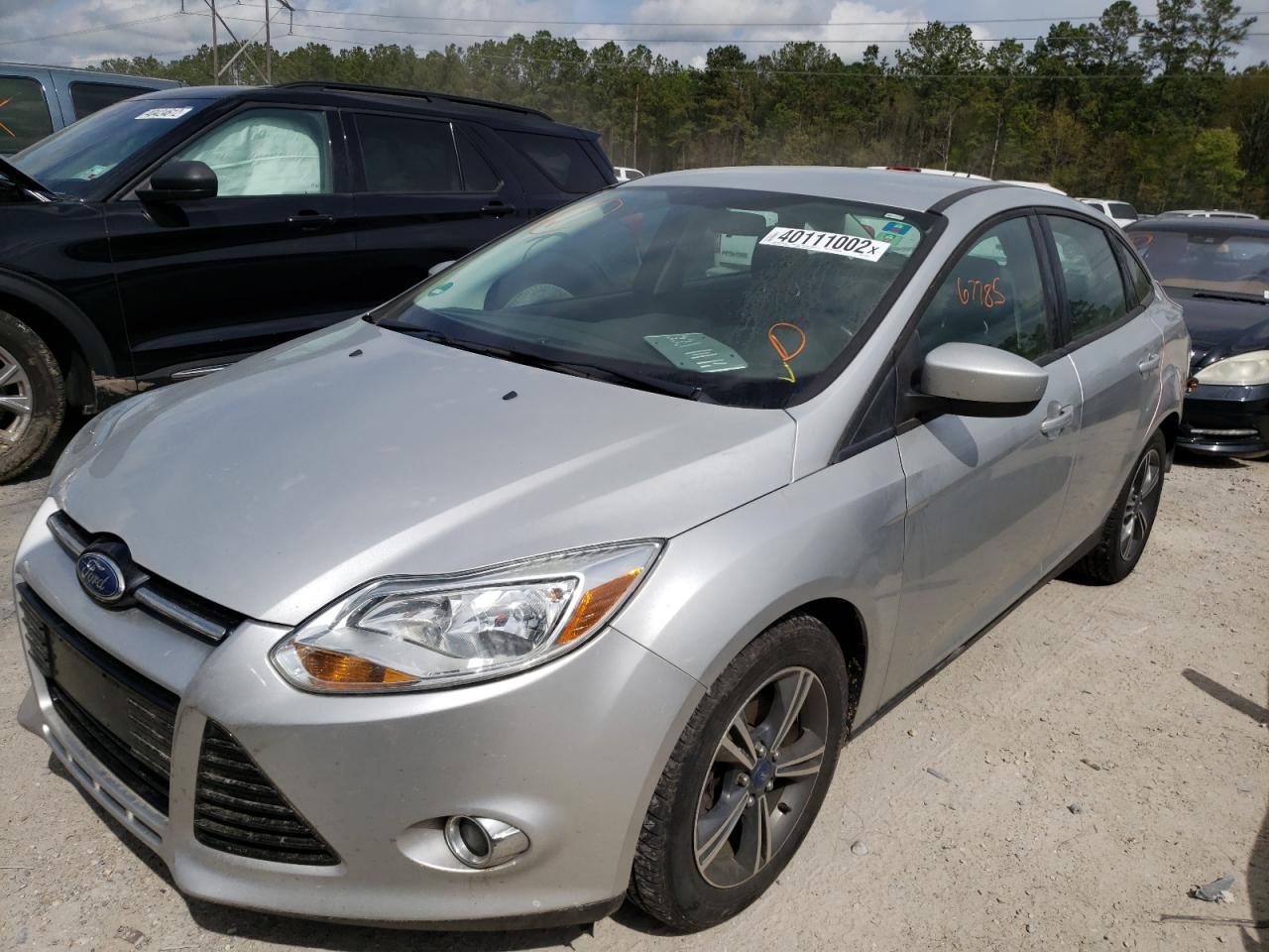Photo 2 from auction – 2012 FORD FOCUS SE with VIN 1FAHP3F21CL259517