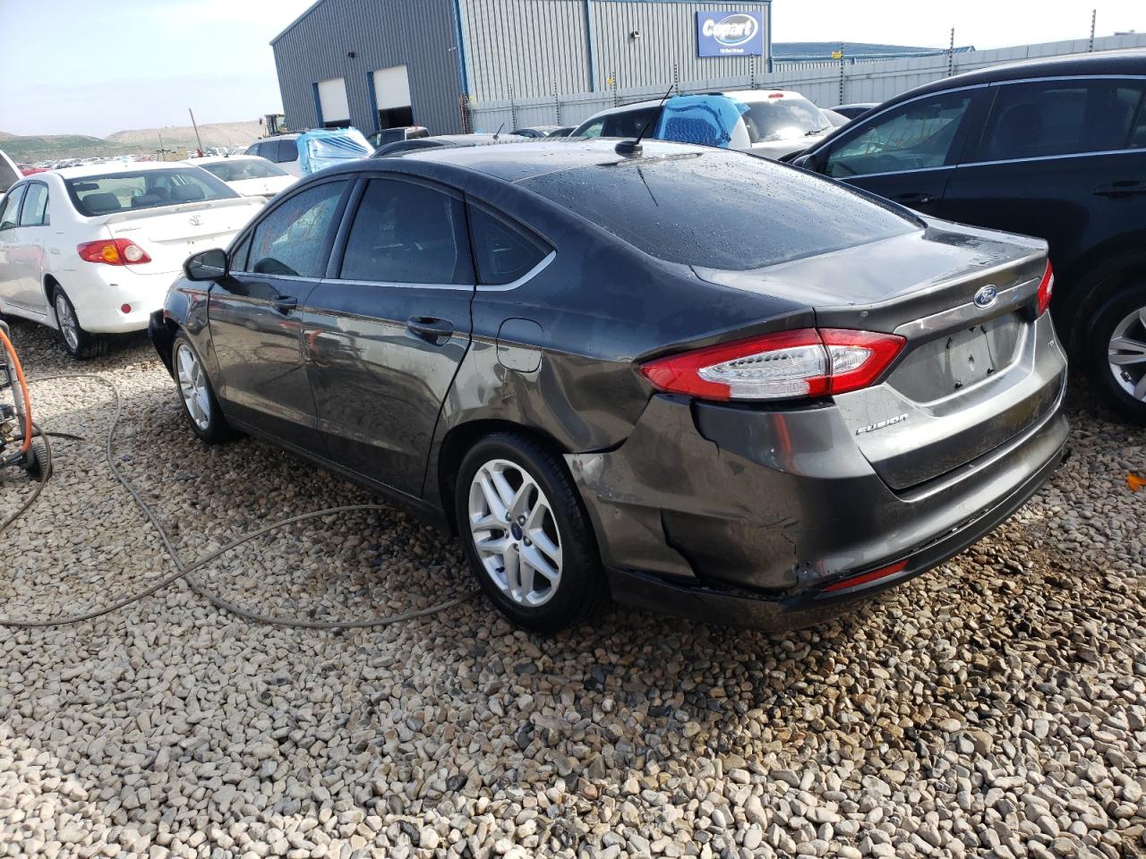 Photo 3 from auction – 2016 FORD FUSION SE with VIN 3FA6P0H73GR330352