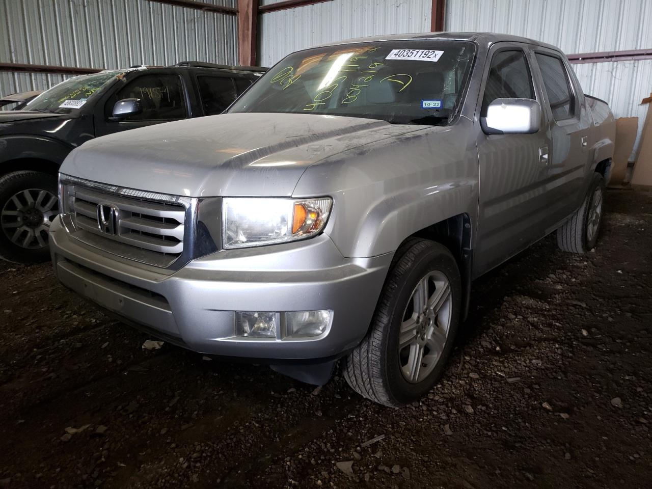 Photo 2 from auction – 2012 HONDA RIDGELINE with VIN 5FPYK1F5XCB004219
