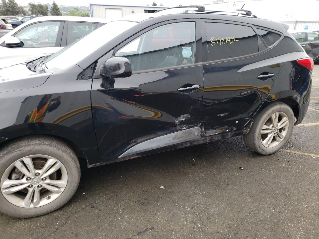 Photo 9 from auction – 2011 HYUNDAI TUCSON GLS with VIN KM8JUCACXBU309565