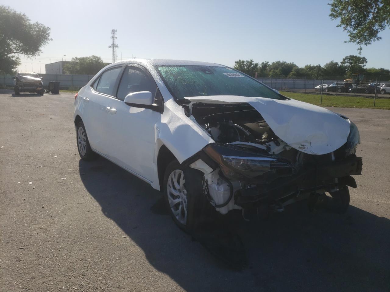 TOYOTA COROLLA L 2019 with VIN 5YFBURHE3KP866740 - Photo from auction