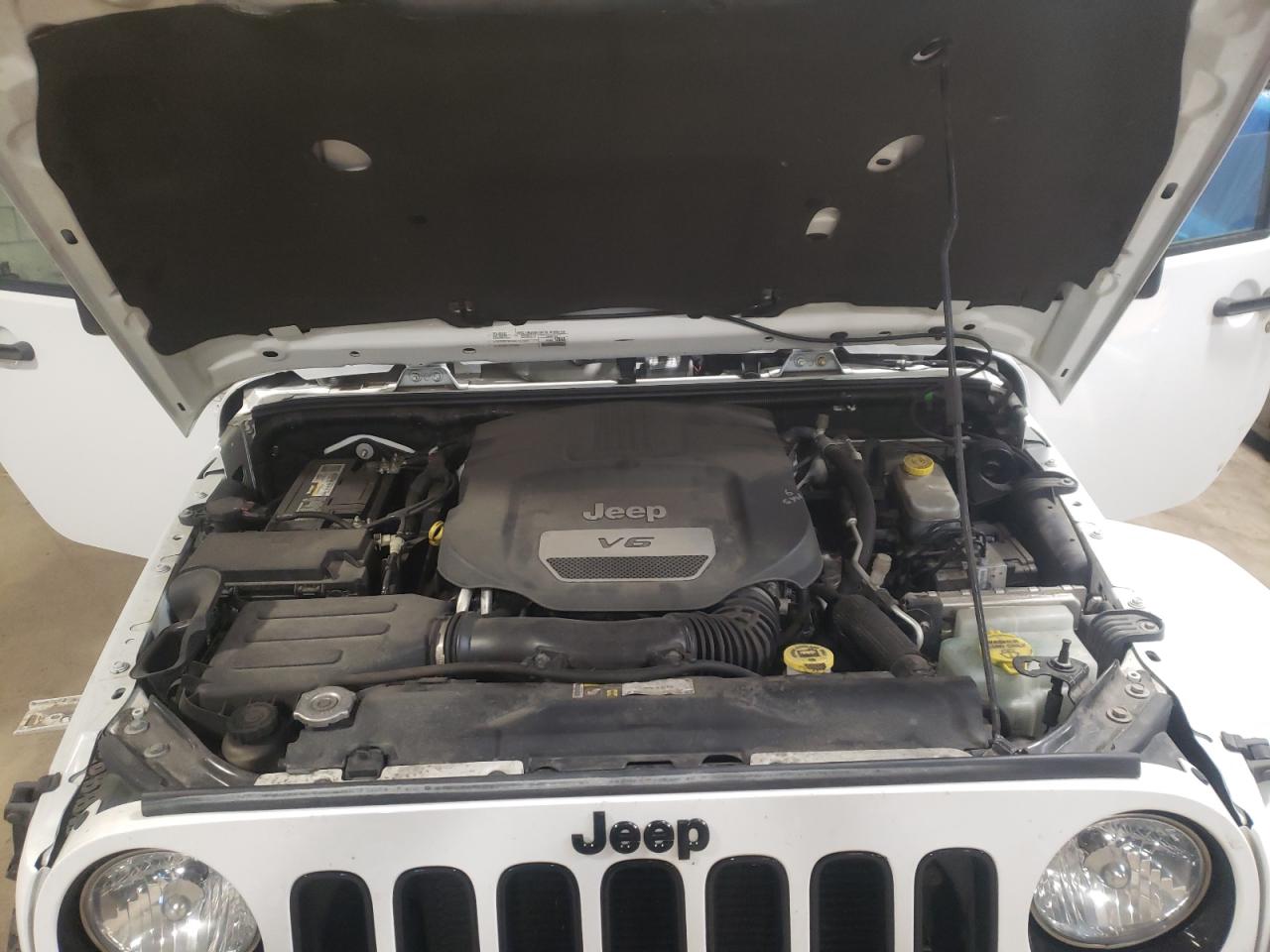 Photo 7 from auction – 2015 JEEP WRANGLER S with VIN 1C4GJWBG5FL676170