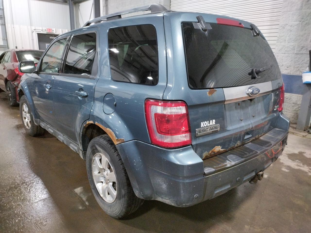Photo 3 from auction – 2011 FORD ESCAPE LIM with VIN 1FMCU9EG7BKA38467