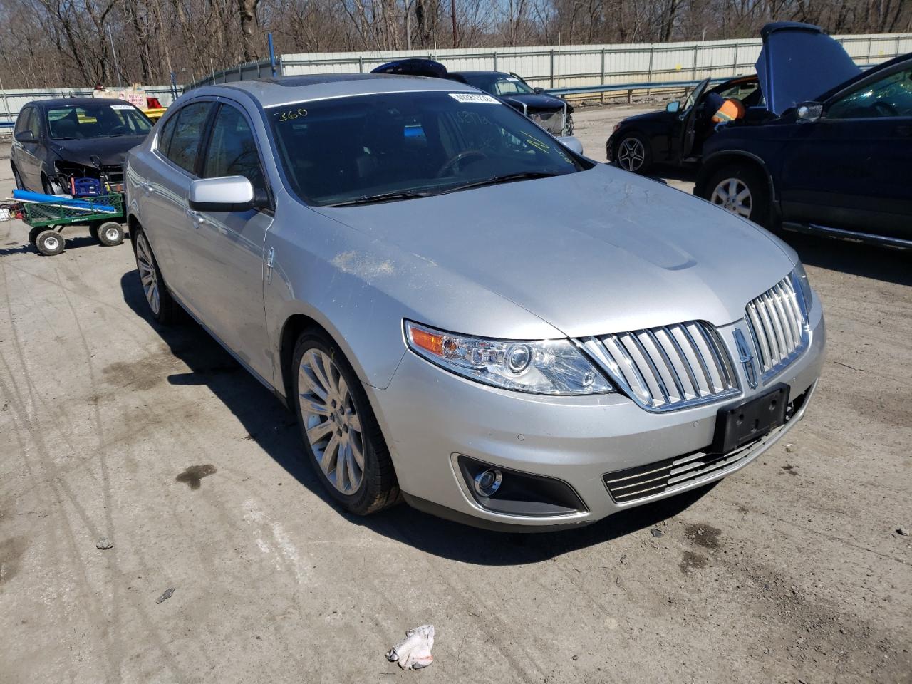 LINCOLN MKS 2011 with VIN 1LNHL9DR3BG609919 - Photo from auction