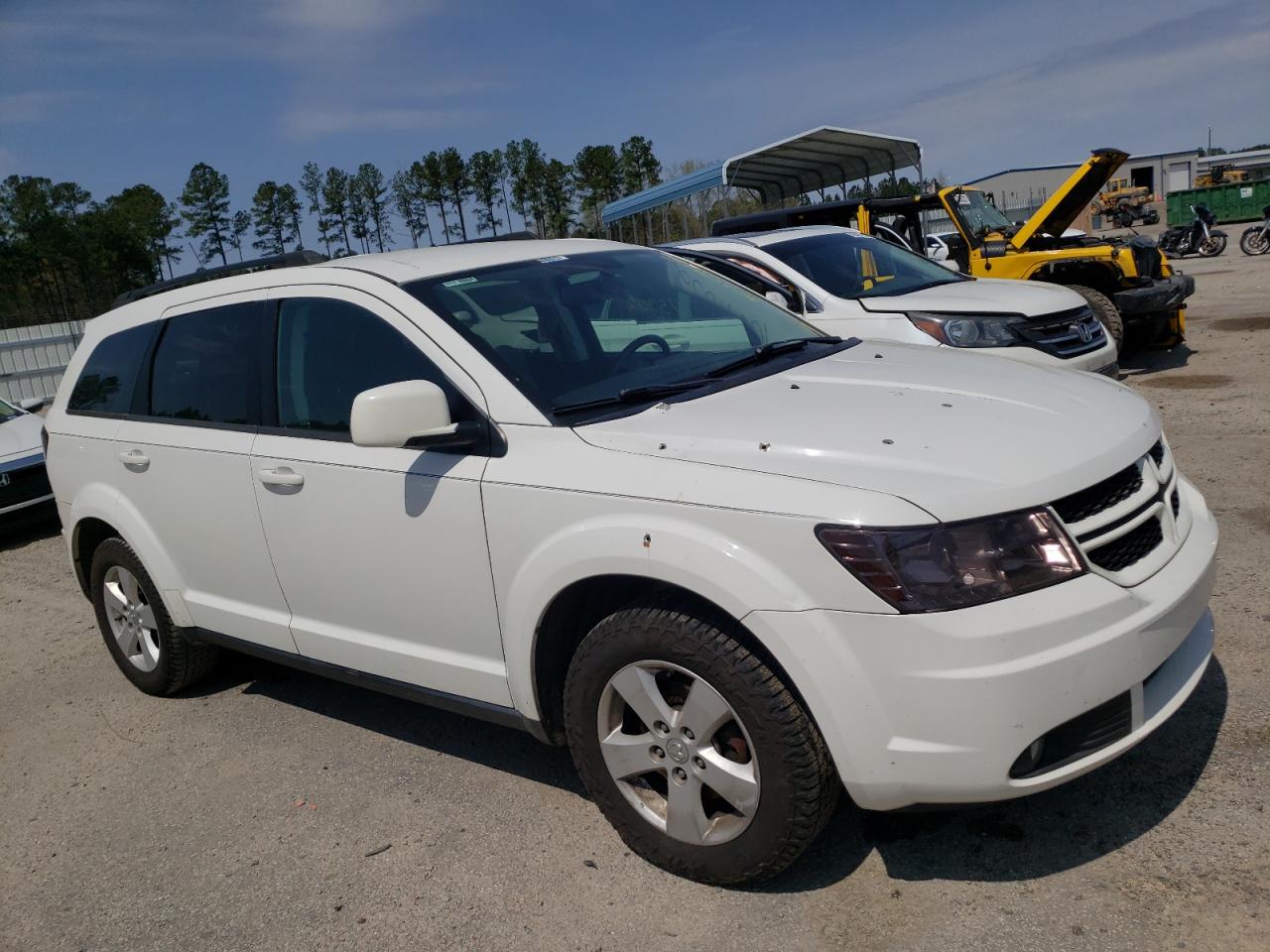 DODGE JOURNEY SX 2010 with VIN 3D4PG5FV6AT103392 - Photo from auction