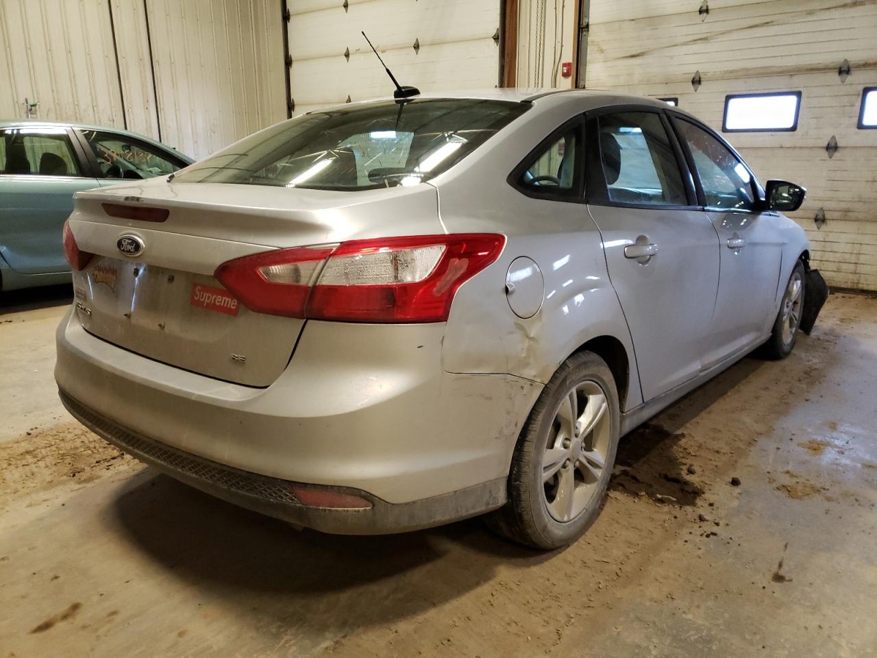 Photo 4 from auction – 2013 FORD FOCUS SE with VIN 1FADP3F27DL342675