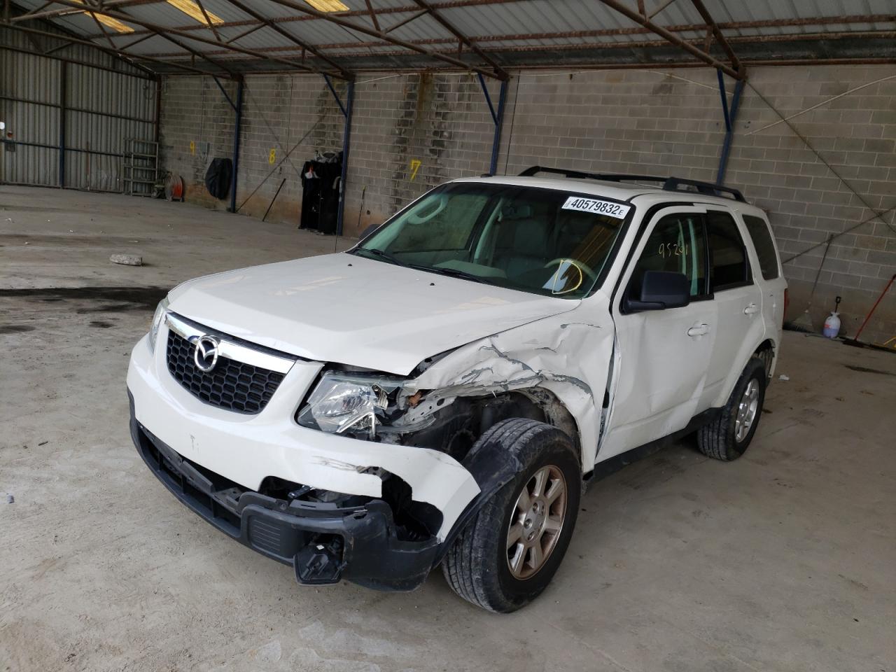 Photo 2 from auction – 2010 MAZDA TRIBUTE I with VIN 4F2CY0C77AKM02800