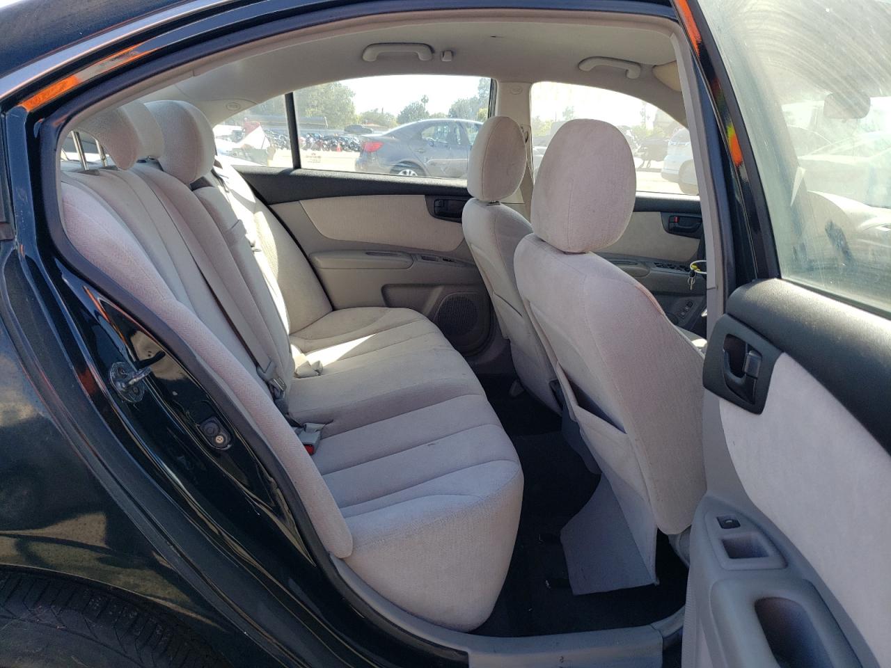 Photo 6 from auction – 2007 KIA OPTIMA LX with VIN KNAGE123775137461