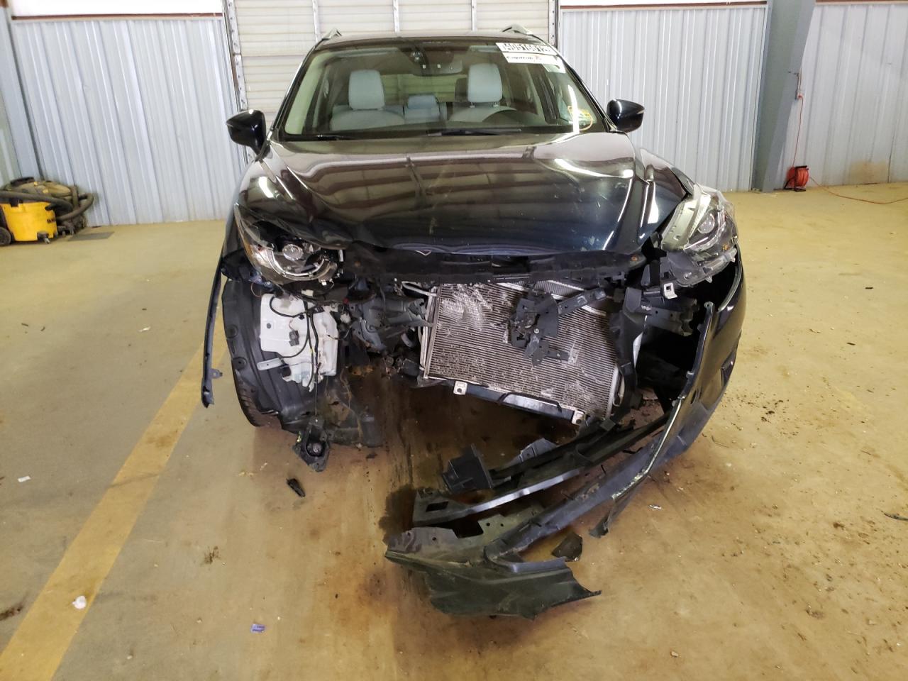 Photo 9 from auction – 2016 MAZDA CX-5 GT with VIN JM3KE4DYXG0707125