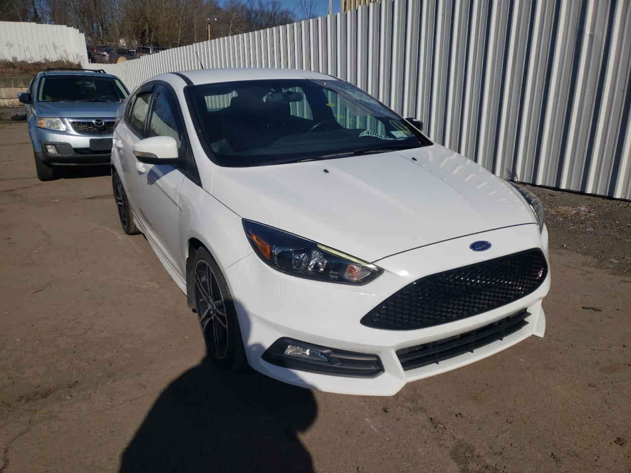 FORD FOCUS ST 2016 with VIN 1FADP3L96GL354337 - Photo from auction
