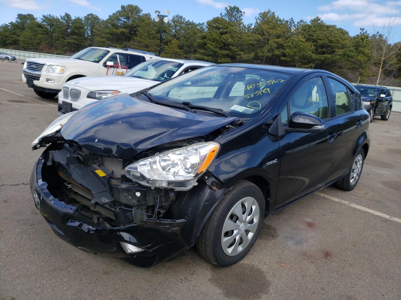 Photo 2 from auction – 2014 TOYOTA PRIUS C with VIN JTDKDTB34E1573989