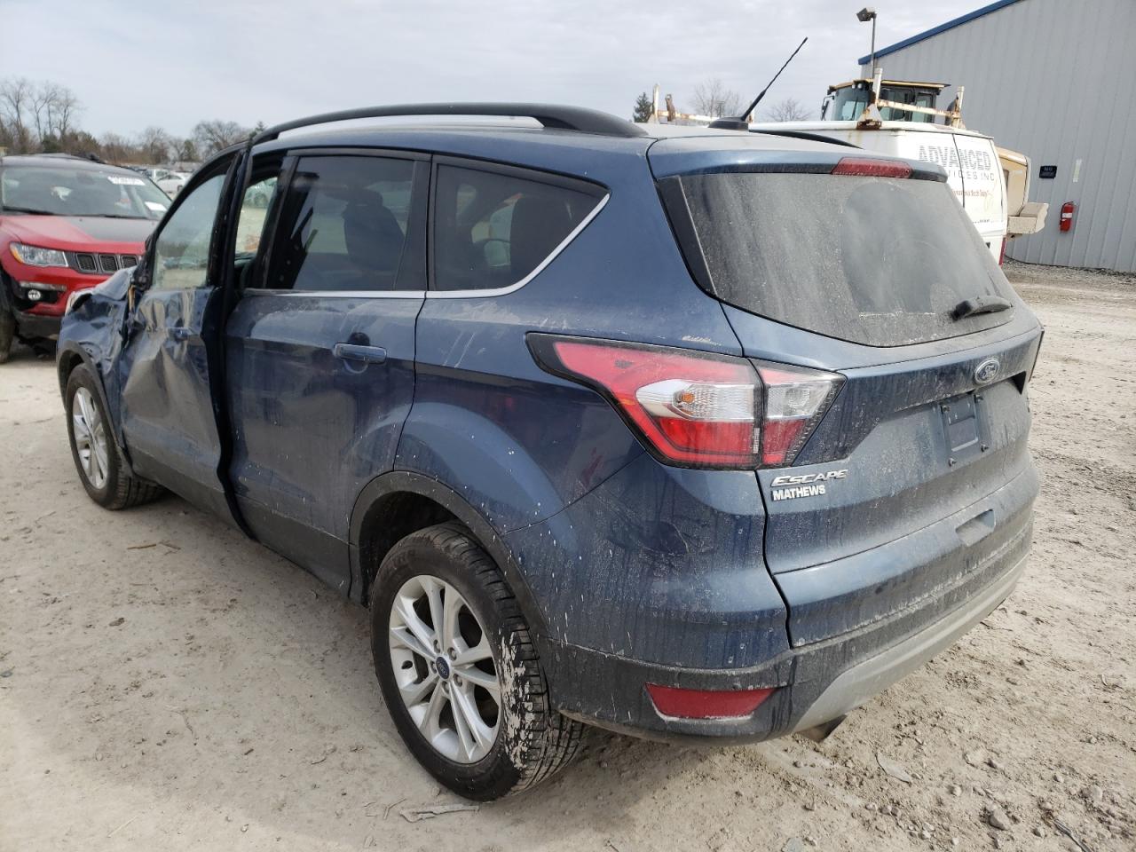 Photo 3 from auction – 2018 FORD ESCAPE SE with VIN 1FMCU9GD9JUC46551