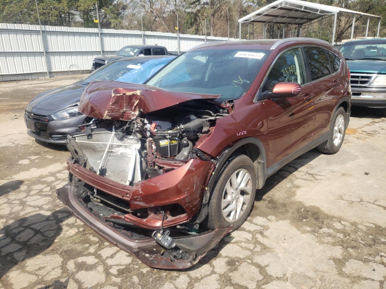 Photo 2 from auction – 2016 HONDA CR-V EXL with VIN 2HKRM3H73GH515182