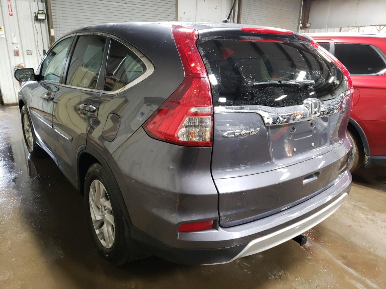 Photo 3 from auction – 2016 HONDA CR-V EX with VIN 3CZRM3H56GG724515
