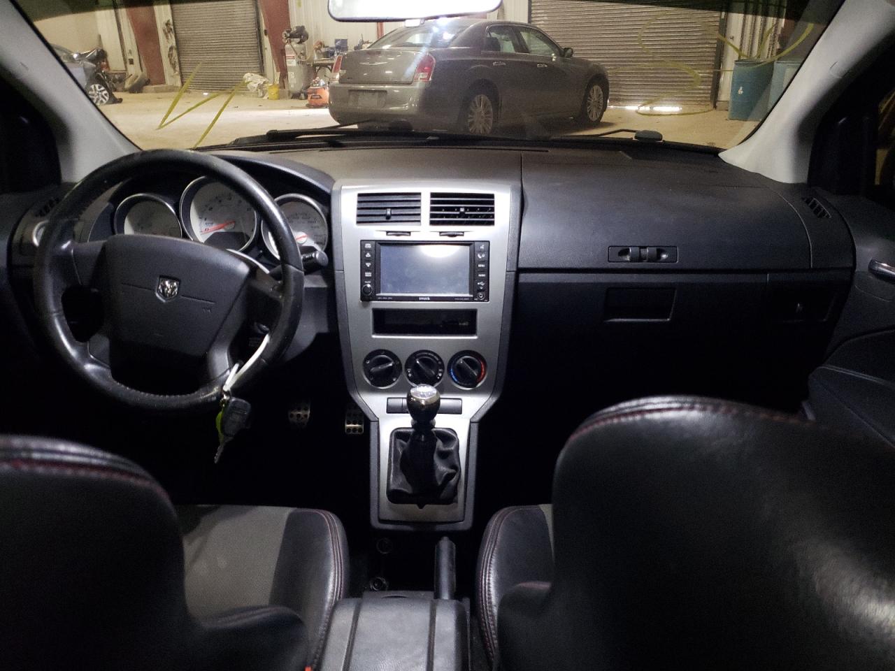 Photo 9 from auction – 2009 DODGE CALIBER SR with VIN 1B3HB68F39D220474