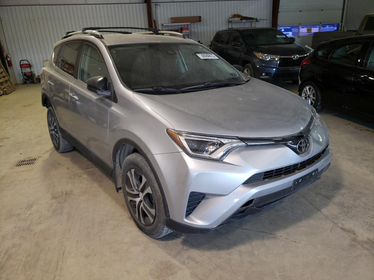 TOYOTA RAV4 LE 2017 with VIN 2T3BFREV3HW597698 - Photo from auction