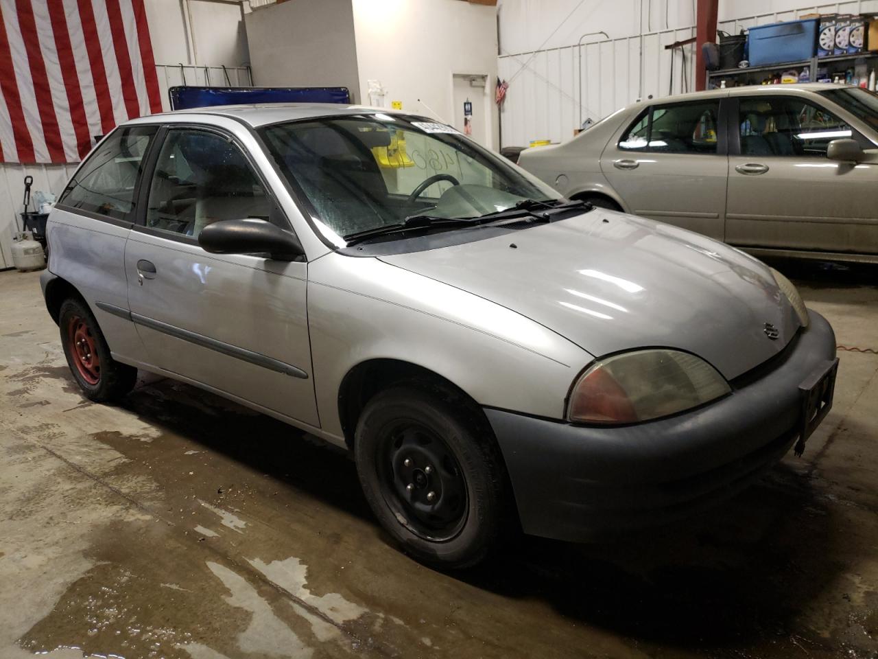 SUZUKI SWIFT BASE 2001 with VIN 2S2AB21H216602086 - Photo from auction