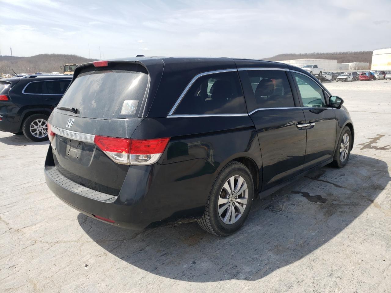 Photo 4 from auction – 2014 HONDA ODYSSEY EX with VIN 5FNRL5H62EB016519