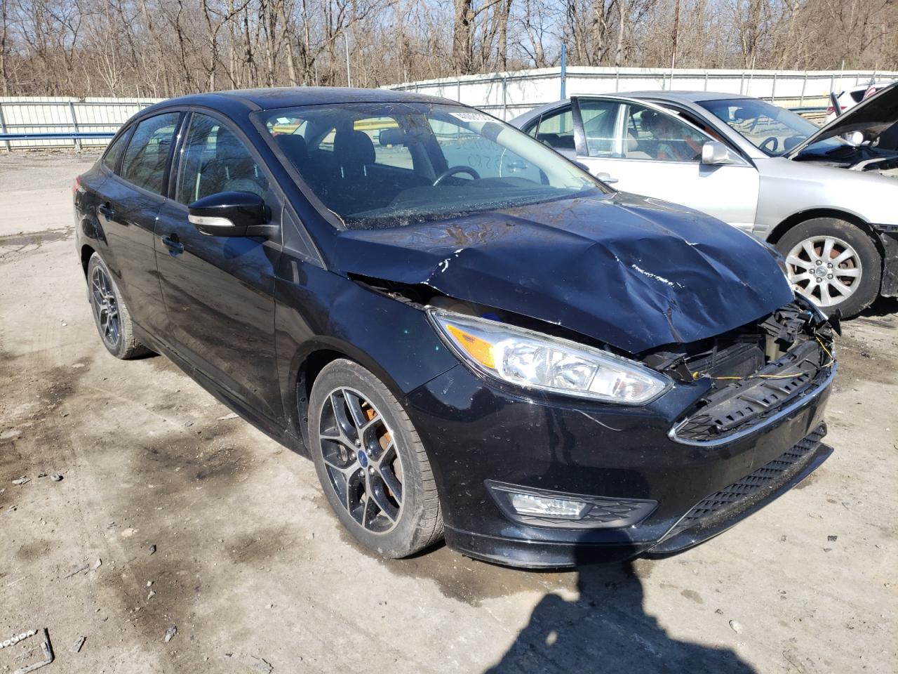 FORD FOCUS SE 2016 with VIN 1FADP3F27GL403253 - Photo from auction