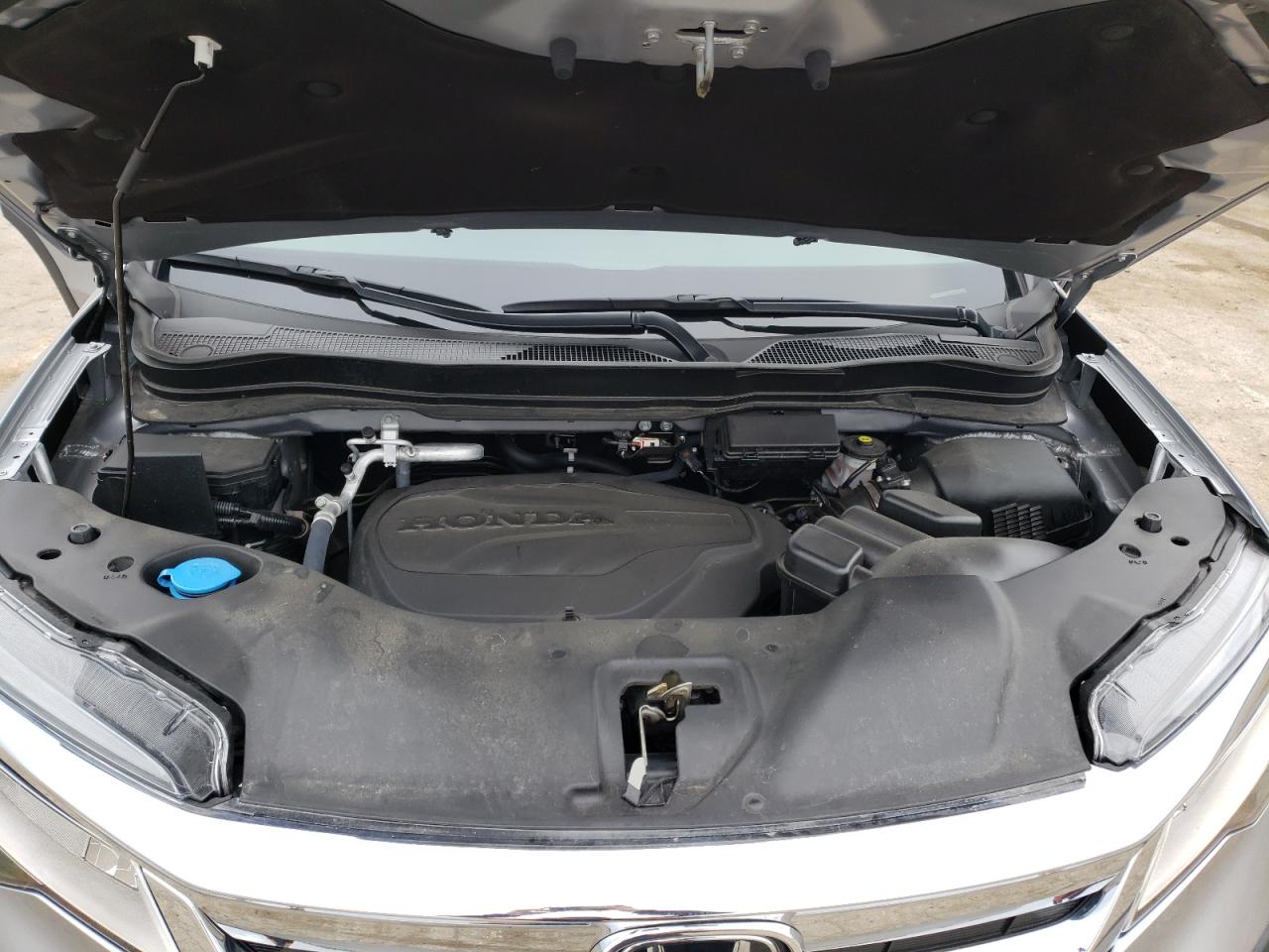 Photo 7 from auction – 2021 HONDA PILOT ELIT with VIN 5FNYF6H09MB072931