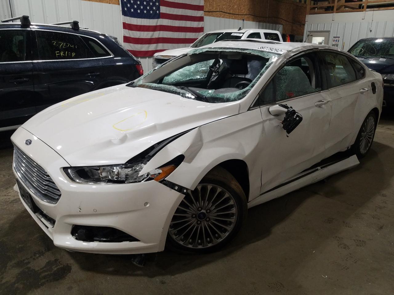Photo 2 from auction – 2016 FORD FUSION TIT with VIN 3FA6P0D98GR196767