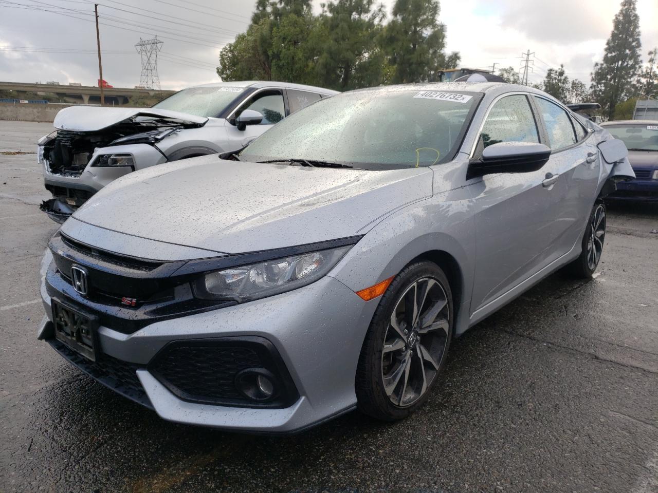 Photo 2 from auction – 2017 HONDA CIVIC SI with VIN 2HGFC1E51HH707628