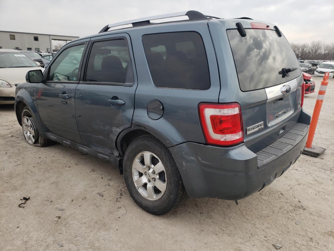 Photo 3 from auction – 2010 FORD ESCAPE LIM with VIN 1FMCU0EG5AKD11187