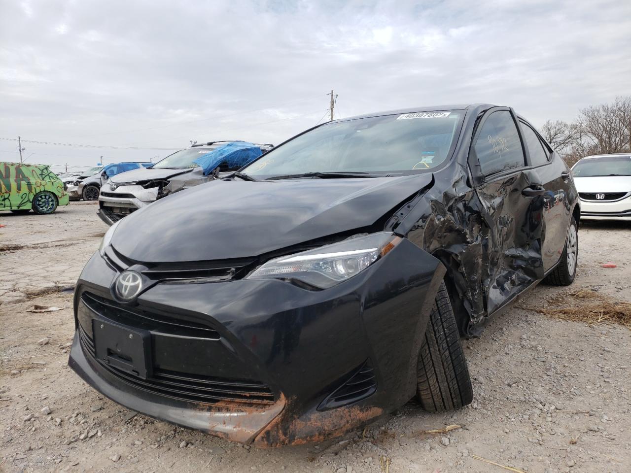 Photo 2 from auction – 2018 TOYOTA COROLLA L with VIN 5YFBURHE0JP785872