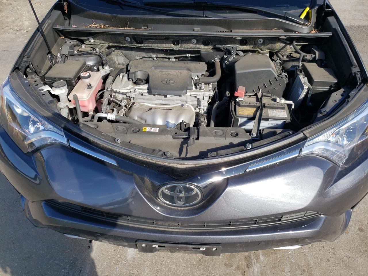 Photo 7 from auction – 2018 TOYOTA RAV4 XLE with VIN JTMRFREV0JJ235346